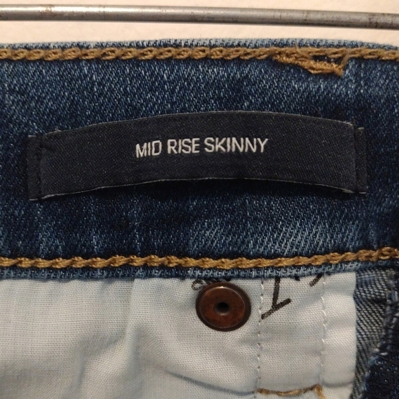 Calvin Klein - Distressed Mid Rise Skinny Jeans - Picture 12 of 15